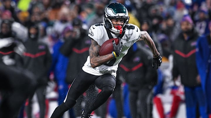 Philadelphia Eagles wide receiver Devonta Smith (6) runs against the Buffalo Bills after making a catch in the second quarter at Highmark Stadium. Mandatory Credit: Mark Konezny-Imagn Images