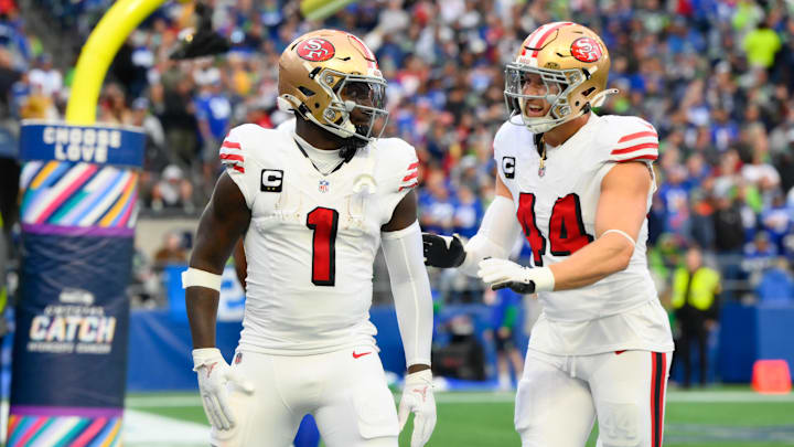Oct 10, 2024; Seattle, Washington, USA; San Francisco 49ers wide receiver Deebo Samuel Sr. (1) and San Francisco 49ers fullback Kyle Juszczyk (44) celebrate after Deebo Samuel Sr. (1) scored a touchdown against the Seattle Seahawks during the first half at Lumen Field. Mandatory Credit: Steven Bisig-Imagn Images