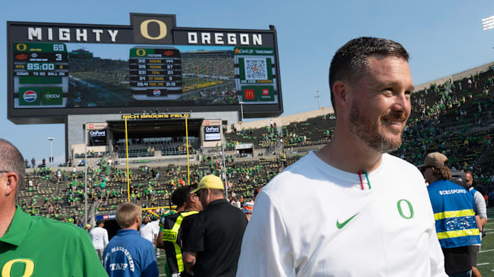 Oregon Head Coach Dan Lanning leaves the field after the win over Oklahoma State at Autzen.