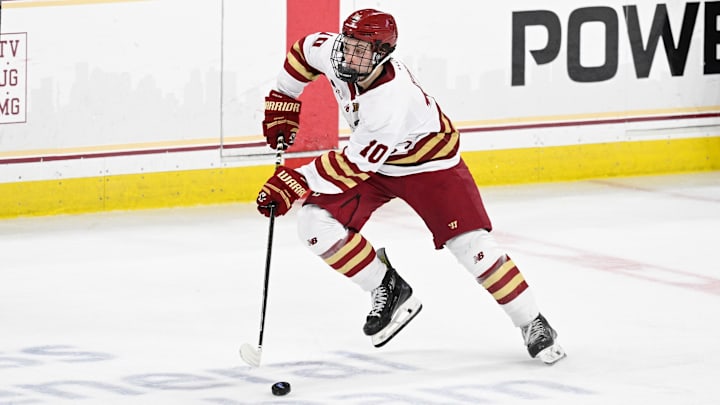 Feb 28, 2025; Chestnut Hill, MA, USA; Boston College forward James Hagens (10) skates with the puck during the second period against the University of New Hampshire Wildcats at Conte Forum. Mandatory Credit: Eric Canha-Imagn Images