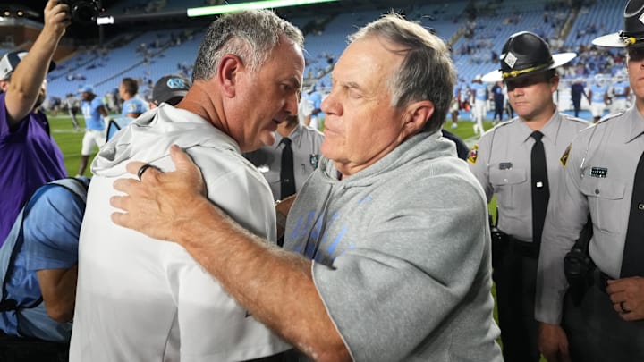Sep 1, 2025; Chapel Hill, North Carolina, USA; North Carolina Tar Heels head coach Bill Belichick with TCU Horned Frogs head coach Sonny Dykes after the game at Kenan Stadium. Mandatory Credit: Bob Donnan-Imagn Images