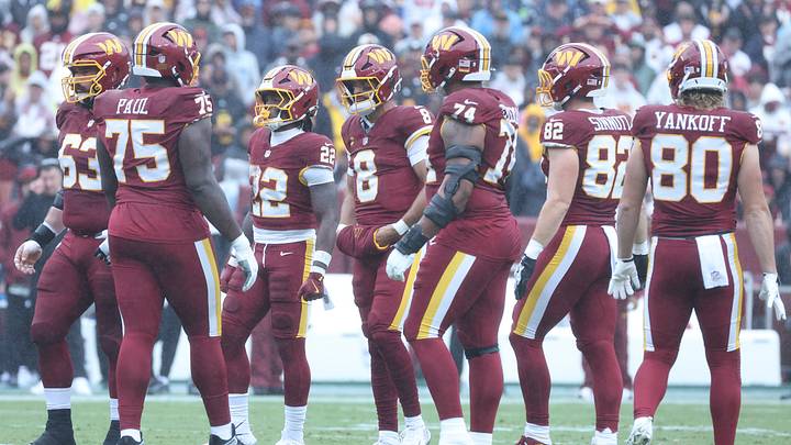 Sep 27, 2026; Landover, Maryland, USA;  Washington Commanders quarterback Marcus Mariota (8) huddles up the offense against the Seattle Seahawks in the first half at Northwest Stadium.  Mandatory Credit: Amber Searls-Imagn Images
