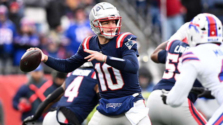 Jan 5, 2025; Foxborough, Massachusetts, USA; New England Patriots quarterback Drake Maye (10) looks to throw against the Buffalo Bills during the first half at Gillette Stadium. Mandatory Credit: Brian Fluharty-Imagn Images