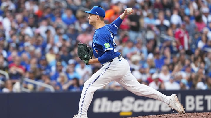 Sep 29, 2024; Toronto, Ontario, CAN; Toronto Blue Jays relief pitcher Brett de Geus (31) throws a pitch against the Miami Marlins during the sixth inning at Rogers Centre. Mandatory Credit: Nick Turchiaro-Imagn Images