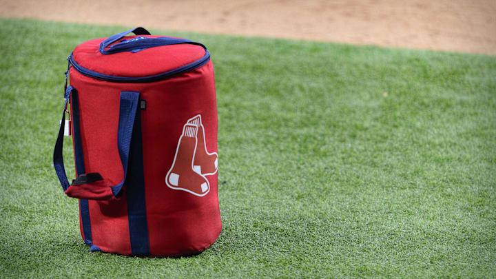 Apr 29, 2021; Arlington, Texas, USA; A view of the Boston Red Sox logo and a field bag during batting practice before the game between the Texas Rangers and the Boston Red Sox at Globe Life Field. Mandatory Credit: Jerome Miron-Imagn Images