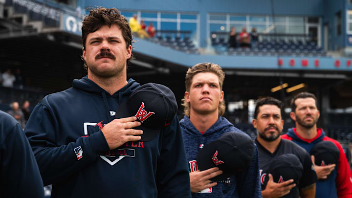 Pitchers Payton Tolle (left) and Connelly Early (second from left) stand for the national anthem ahead of Triple-A Worcester's game at Polar Park on Aug. 21, 2025.
