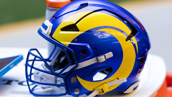 Dec 7, 2025; Glendale, Arizona, USA; Detailed view of a Los Angeles Rams helmet at State Farm Stadium. Mandatory Credit: Mark J. Rebilas-Imagn Images Dec 7, 2025; Glendale, Arizona, USA; Detailed view of a Los Angeles Rams helmet at State Farm Stadium. Mandatory Credit: Mark J. Rebilas-Imagn Images