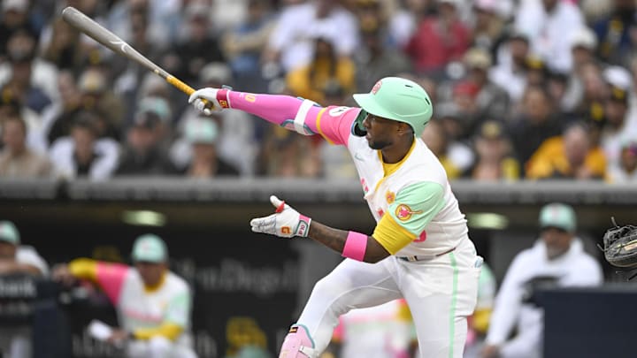 Jun 7, 2024; San Diego, California, USA; San Diego Padres left fielder Jurickson Profar (10) hits a solo home run during the first inning against the Arizona Diamondbacks at Petco Park. Mandatory Credit: Denis Poroy-USA TODAY Sports at Petco Park. Jun 7, 2024; San Diego, California, USA; San Diego Padres left fielder Jurickson Profar (10) hits a solo home run during the first inning against the Arizona Diamondbacks at Petco Park. Mandatory Credit: Denis Poroy-USA TODAY Sports at Petco Park.