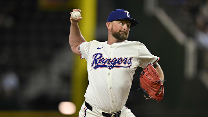 Sep 17, 2024; Arlington, Texas, USA; Texas Rangers relief pitcher Kirby Yates (39) pitches against the Toronto Blue Jays during the game at Globe Life Field. Mandatory Credit: Jerome Miron-Imagn Images