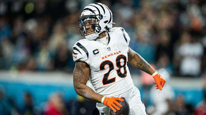 Dec 4, 2023; Jacksonville, Florida, USA; Cincinnati Bengals halfback Joe Mixon (28) runs in for the
