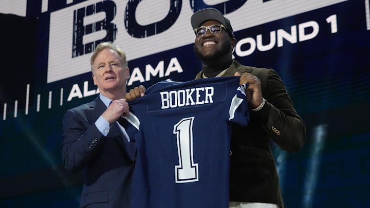 NFL commissioner Roger Goodell with Alabama Crimson Tide offensive lineman Tyler Booker after he is selected by the Dallas Cowboys