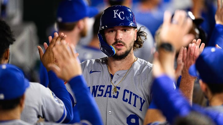 Sep 25, 2025; Anaheim, California, USA; Kansas City Royals designated hitter Vinnie Pasquantino (9) is greeted by teammates after scoring during the ninth inning against the Los Angeles Angels at Angel Stadium. Mandatory Credit: William Liang-Imagn Images