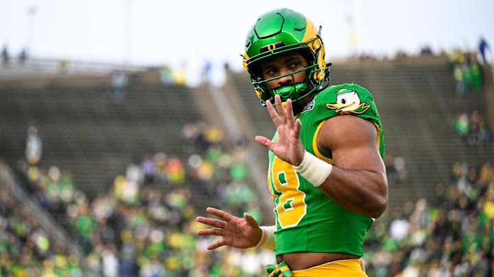 Dec 20, 2025; Eugene, OR, USA; Oregon Ducks tight end Kenyon Sadiq (18) looks on before the game against the James Madison Dukes at Autzen Stadium. Mandatory Credit: Troy Wayrynen-Imagn Images