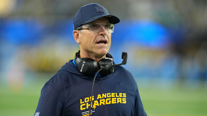 Dec 8, 2025; Inglewood, California, USA;  Los Angeles Chargers head coach Jim Harbaugh reacts in the first half against the Philadelphia Eagles at SoFi Stadium. Mandatory Credit: Kirby Lee-Imagn Images