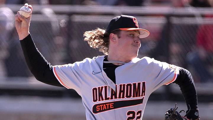 Oklahoma State's Gabe Davis (22) pitches against Texas Tech in game two of the Big 12 home opener, Saturday, March 18, 2023, at Rip Griffin Park.