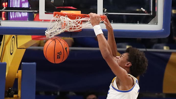 Nov 18, 2024; Pittsburgh, Pennsylvania, USA;  Pittsburgh Panthers guard Brandin Cummings (3) dunks the ball against the Virginia Military Keydets during the second half at the Petersen Events Center. Mandatory Credit: Charles LeClaire-Imagn Images
