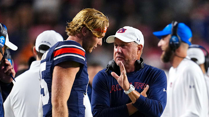 Auburn Tigers Quarterback Hank Brown and head coach Hugh Freeze during the game against the  New Mexico Lobos 