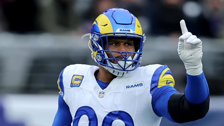 Dec 31, 2023; East Rutherford, New Jersey, USA; Los Angeles Rams defensive tackle Aaron Donald (99) gestures during the first quarter against the New York Giants at MetLife Stadium. Mandatory Credit: Brad Penner-Imagn Images