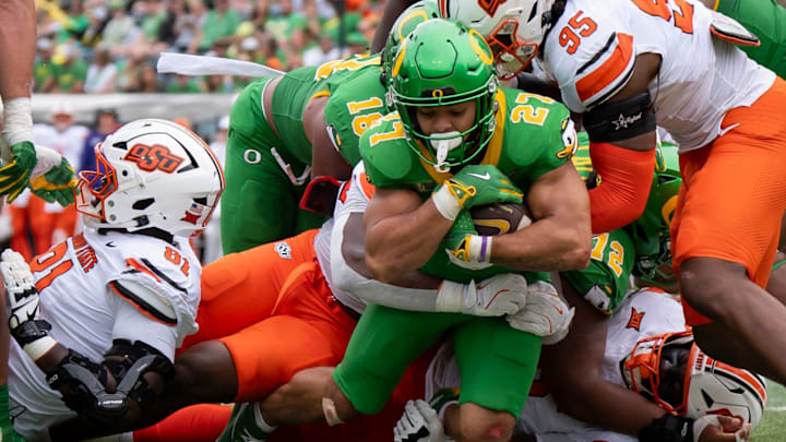 Oregon running back Jayden Limar presses into the end zone for a touchdown as the Oregon Ducks host the Oklahoma State Cowboys on Sept. 6, 2025, at Autzen Stadium in Eugene, Oregon. Oregon running back Jayden Limar presses into the end zone for a touchdown as the Oregon Ducks host the Oklahoma State Cowboys on Sept. 6, 2025, at Autzen Stadium in Eugene, Oregon.