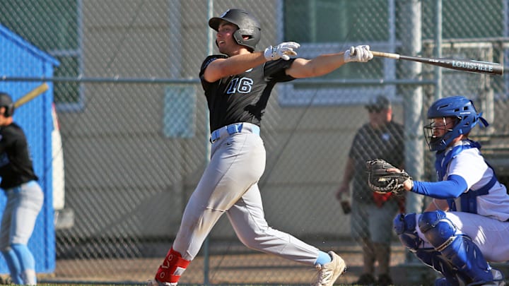 South Salem senior Noah Scharer takes a swing at the plate during the Saxons’ 25-4 win at McNary. Scharer had two hits and two RBIs in the victory.