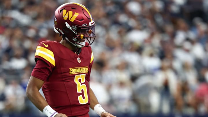 Oct 19, 2025; Arlington, Texas, USA; Washington Commanders quarterback Jayden Daniels (5) celebrates after a touchdown against the Dallas Cowboys during the first quarter of the game at AT&T Stadium. Oct 19, 2025; Arlington, Texas, USA; Washington Commanders quarterback Jayden Daniels (5) celebrates after a touchdown against the Dallas Cowboys during the first quarter of the game at AT&T Stadium.