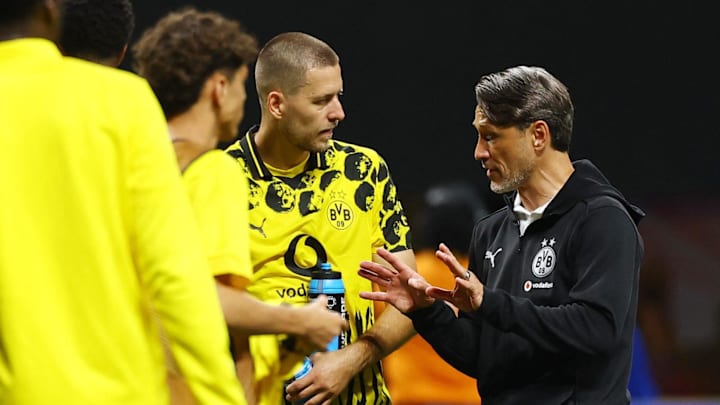 [Subscription Customers Only] Jul 1, 2025; Atlanta, Georgia, USA; Borussia Dortmund coach Niko Kovac reacts with defender Waldemar Anton (3) after during a round of 16 match of the 2025 FIFA Club World Cup at Mercedes-Benz Stadium. 