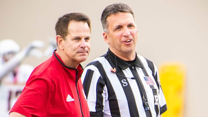 Indiana Head Coach Curt Cignetti talks with an referee before the start of the Indiana versus Western Illinois football game at Memorial Stadium on Friday, Sept. 6, 2024.
