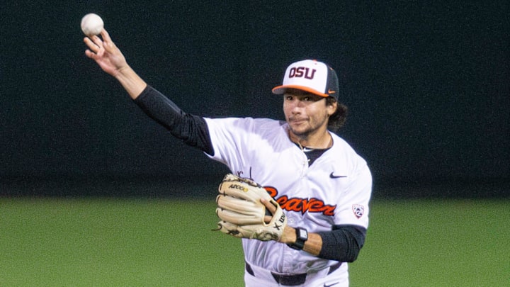 Oregon State's AJ Singer (7) throws the ball to first base during an NCAA college baseball game at Goss Stadium on Friday, March 7, 2025, in Corvallis, Ore.