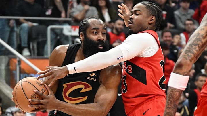 Apr 26, 2026; Toronto, Ontario, CAN;  Cleveland Cavaliers guard James Harden (1) looks for a passing option as he is covered by Toronto Raptors guard Jamal Shead (23) during game four of the first round of the 2026 NBA Playoffs at Scotiabank Arena. Mandatory Credit: Dan Hamilton-Imagn Images