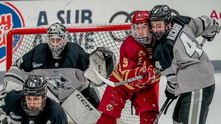 Guillaume Richard defends BC's Ryan Leonard, with goalie John Driscoll. PC beats number one ranked Boston College. Guillaume Richard defends BC's Ryan Leonard, with goalie John Driscoll. PC beats number one ranked Boston College.