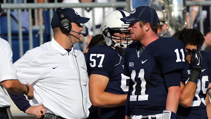 Former Penn State football coach Bill O'Brien talks to quarterback Matt McGloin on the sideline during the Nittany Lions' 2012 game vs. Navy. Former Penn State football coach Bill O'Brien talks to quarterback Matt McGloin on the sideline during the Nittany Lions' 2012 game vs. Navy.