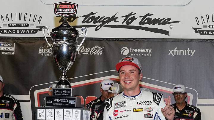 Sep 6, 2026; Darlington, South Carolina, USA;  Joe Gibbs Racing driver Christopher Bell (20) celebrates his win during the Southern 500 at Darlington Raceway.  Jim Dedmon-Imagn Images