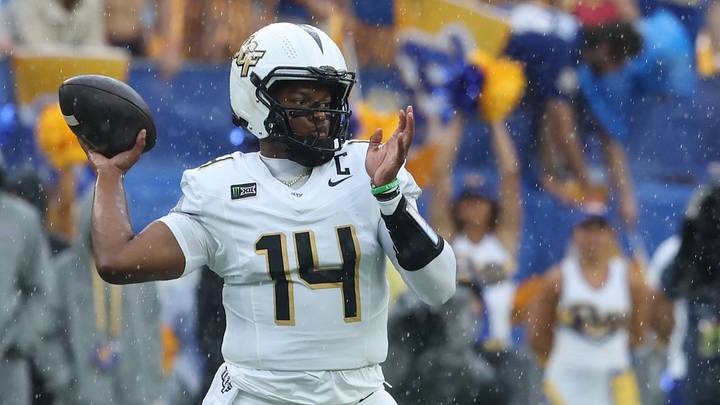 Sep 12, 2026; Pittsburgh, Pennsylvania, USA; UCF Knights quarterback Alonza Barnett III (14) passes against the Pittsburgh Panthers during the first quarter at Acrisure Stadium. Mandatory Credit: Charles LeClaire-Imagn Images Sep 12, 2026; Pittsburgh, Pennsylvania, USA; UCF Knights quarterback Alonza Barnett III (14) passes against the Pittsburgh Panthers during the first quarter at Acrisure Stadium. Mandatory Credit: Charles LeClaire-Imagn Images