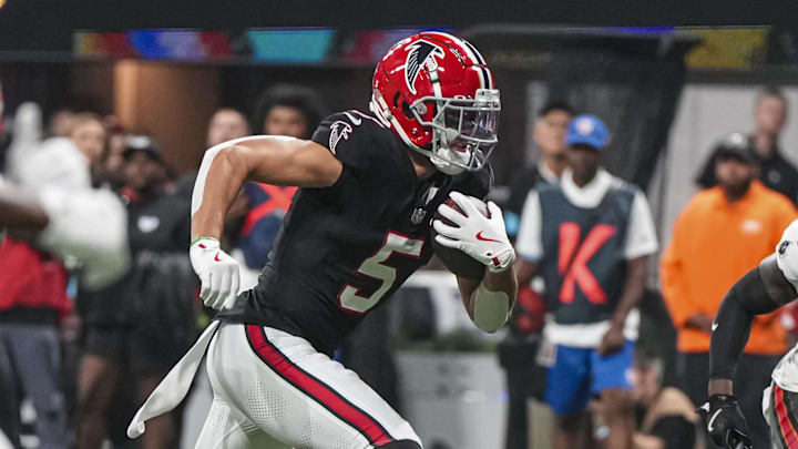 Atlanta Falcons wide receiver Drake London runs past Tampa Bay Buccaneers safety Tykee Smith for a touchdown. Atlanta Falcons wide receiver Drake London runs past Tampa Bay Buccaneers safety Tykee Smith for a touchdown.