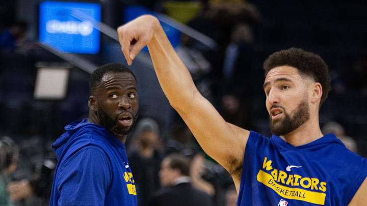 Jan 2, 2023; San Francisco, California, USA; Golden State Warriors forward Draymond Green (left) and guard Klay Thompson warm up before taking on the Atlanta Hawks at Chase Center. Mandatory Credit: D. Ross Cameron-USA TODAY Sports