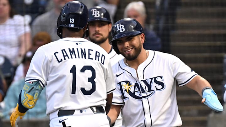 Jul 23, 2025; St. Petersburg, Florida, USA; Tampa Bay Rays third baseman Junior Caminero (13) celebrates with  first baseman Jonathan Aranda (62) after hitting  a two run home run  in the first inning against the Chicago White Sox at George M. Steinbrenner Field. Mandatory Credit: Jonathan Dyer-Imagn Images