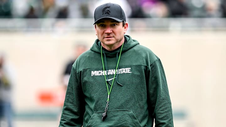 Michigan State's head coach Jonathan Smith walks to the sideline during the Spring Showcase on