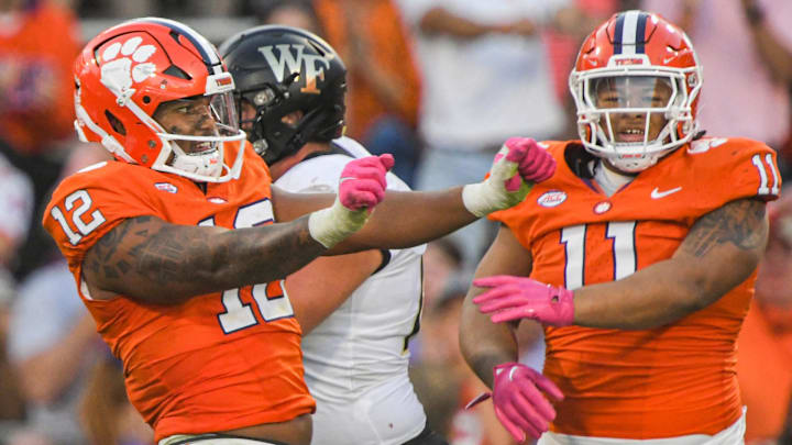 Oct 7, 2023; Clemson, South Carolina, USA; Clemson Tigers defensive lineman T.J. Parker (12) reacts after sacking Wake Forest Demon Deacons quarterback Mitch Griffis (not pictured) during the fourth quarter at Memorial Stadium.
