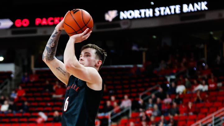 Feb 12, 2025; Raleigh, North Carolina, USA; Louisville Cardinals guard Reyne Smith (6) shoots a three pointer during the second half of the game against the North Carolina State Wolfpack at Lenovo Center. Mandatory Credit: Jaylynn Nash-Imagn Images Feb 12, 2025; Raleigh, North Carolina, USA; Louisville Cardinals guard Reyne Smith (6) shoots a three pointer during the second half of the game against the North Carolina State Wolfpack at Lenovo Center. Mandatory Credit: Jaylynn Nash-Imagn Images