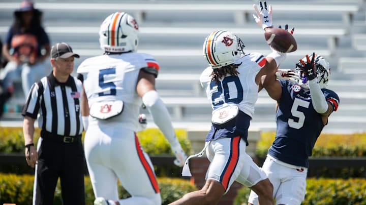 Auburn Tigers defensive back JC Hart (20) breaks up a pass intended for Auburn Tigers wide receiver