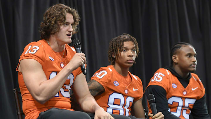 Clemson defensive end Will Heldt (13), left, Clemson wide receiver Tristan Smith (80) and defensive end Jeremiah Alexander (35) during the Clemson Club football National Signing Day wrap up presented by Clemson Seneca Chick-Fil-A at the Poe Indoor Practice Facility at Clemson University in Clemson, S.C. Feb 5, 2025.