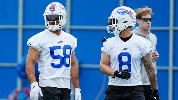 Buffalo Bills linebackers Matt Milano and Terrell Bernard head to another area of their practice field during voluntary workouts on May 27, 2025.