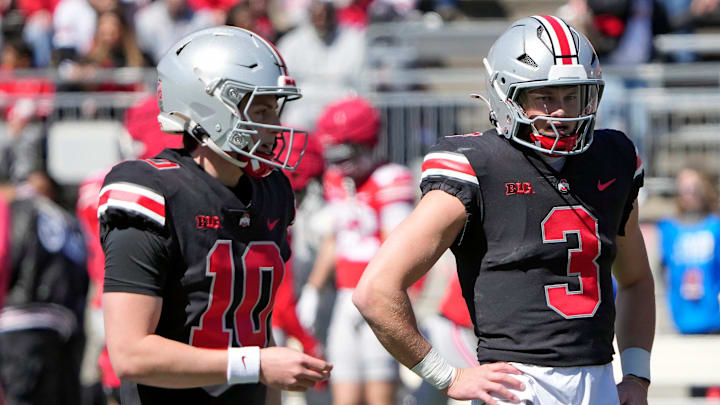 Ohio State Buckeye quarterbacks Julian Sayin (10) and Lincoln Kienholz (3) warm up before the start of the spring game at Ohio Stadium on April 12, 2025. Ohio State Buckeye quarterbacks Julian Sayin (10) and Lincoln Kienholz (3) warm up before the start of the spring game at Ohio Stadium on April 12, 2025.