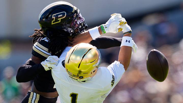Purdue defensive back John Slaughter breaks up a pass.