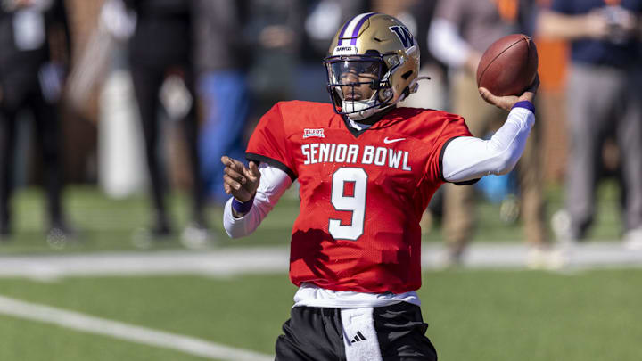 Jan 30, 2024; Mobile, AL, USA; National quarterback Michael Penix Jr. of Washington (9) throws the ball during his Reese's Senior bowl practice.