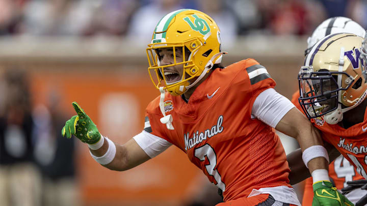 Feb 3, 2024; Mobile, AL, USA; National defensive back Evan Williams of Oregon (3) celebrates his interception.