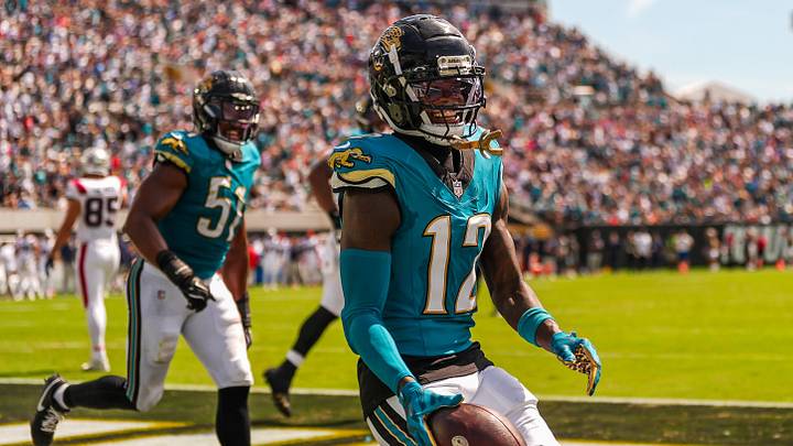 Jacksonville Jaguars wide receiver/cornerback Travis Hunter (12) celebrates his interception in the second quarter during an NFL football game at EverBank Stadium, Sunday, September 27, 2026, in Jacksonville, Fla. [Doug Engle/Florida Times-Union]