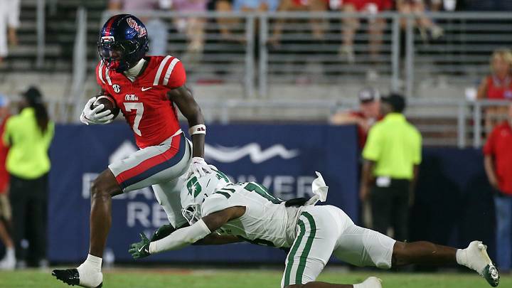 Sep 12, 2026; Oxford, Mississippi, USA; Mississippi Rebels wide receiver Traylon Ray (7) runs after a catch as Charlotte 49ers defensive back Chase Usher (18) attempts to make the tackle during the second quarter at Vaught-Hemingway Stadium. Mandatory Credit: Petre Thomas-Imagn Images Sep 12, 2026; Oxford, Mississippi, USA; Mississippi Rebels wide receiver Traylon Ray (7) runs after a catch as Charlotte 49ers defensive back Chase Usher (18) attempts to make the tackle during the second quarter at Vaught-Hemingway Stadium. Mandatory Credit: Petre Thomas-Imagn Images