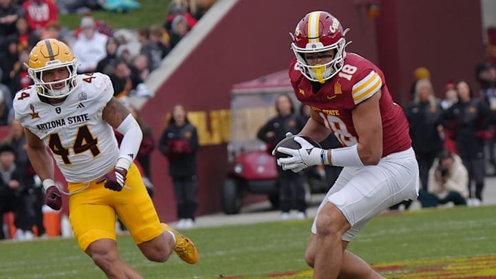 Iowa State Cyclones' tight end Benjamin Brahmer (18) runs with the ball after making a catch ball around Arizona State Sun Devils linebacker Keyshaun Elliott (44) during the first quarter in the Big-12 showdown at jack Trice Stadium on Nov. 1, 2025, in Ames, Iowa. Iowa State Cyclones' tight end Benjamin Brahmer (18) runs with the ball after making a catch ball around Arizona State Sun Devils linebacker Keyshaun Elliott (44) during the first quarter in the Big-12 showdown at jack Trice Stadium on Nov. 1, 2025, in Ames, Iowa.
