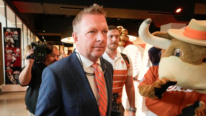 University of Texas baseball coach Jim Schlossnagle arrives at his introductory news conference at the Frank Denius Family University Hall of Fame Wednesday June 26, 2024. University of Texas baseball coach Jim Schlossnagle arrives at his introductory news conference at the Frank Denius Family University Hall of Fame Wednesday June 26, 2024.